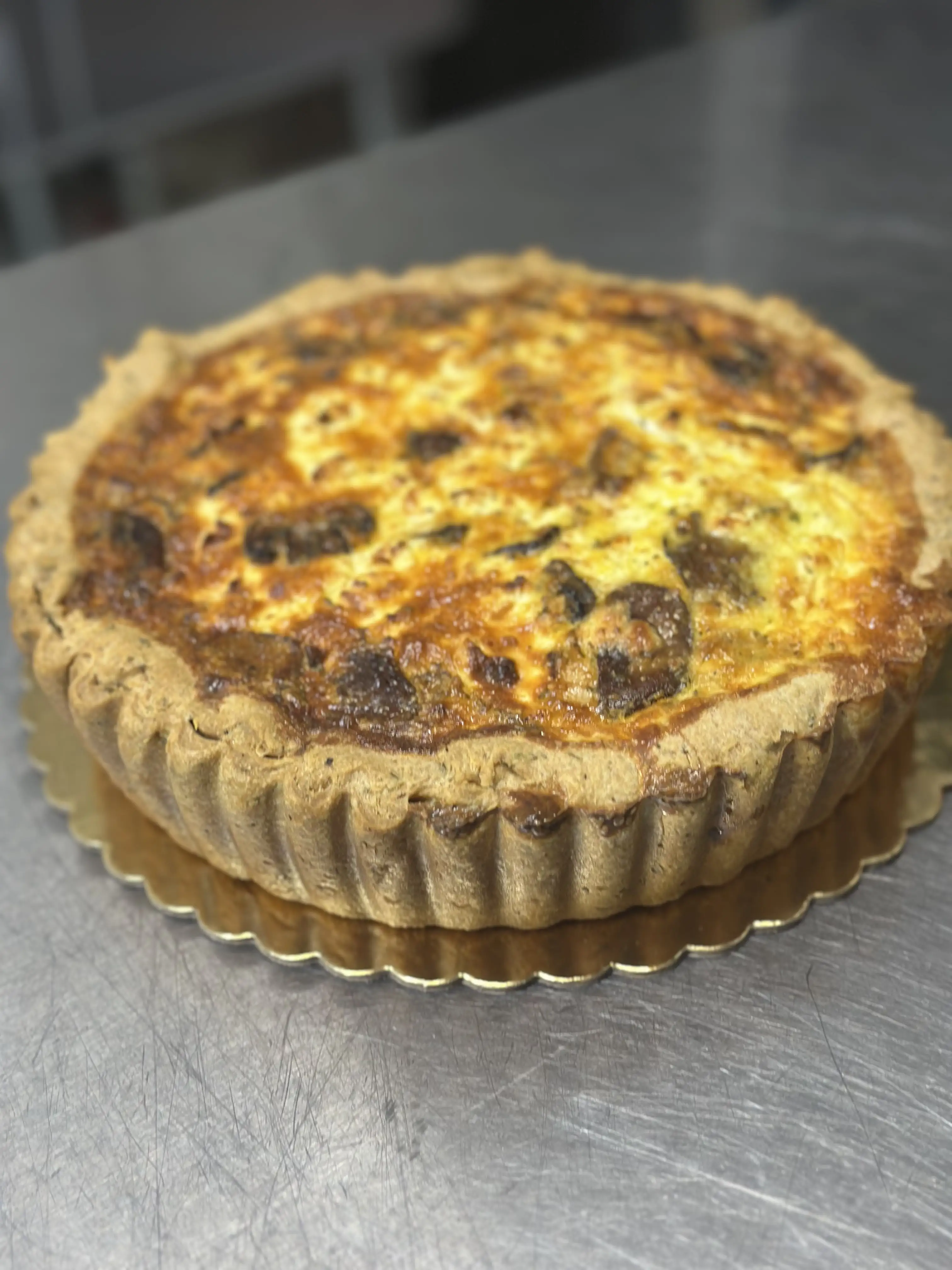 Fresh baked quiche from Le Marche available for your next meal or gathering. 